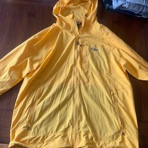 Bright yellow sun shirt/hoodie . Packs itself into pocket for put away